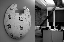 3-dimensional wikipedia logo mounted on an office wall