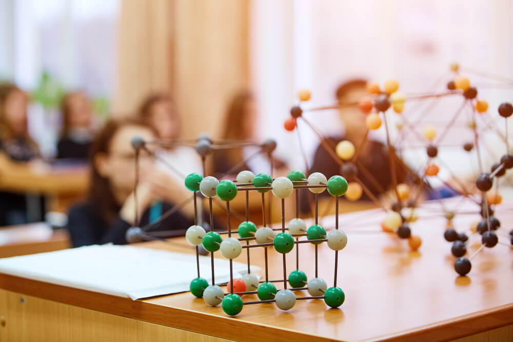 Photo of a chemistry classroom with students and molecular models. Improve your capture rates in STEM classes when you switch to TypeWell from C-Print,